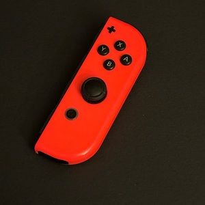 Right Nintendo switch joy con controller in red colour